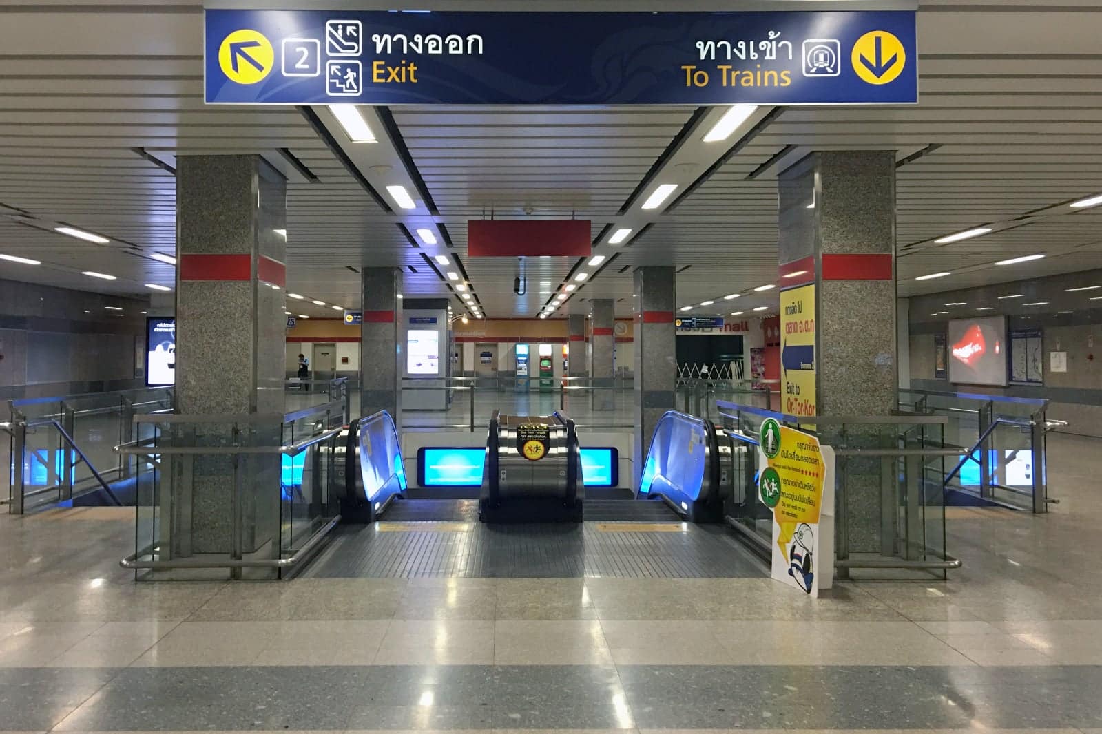 Bangkok MRT train at station with passengers waiting in queue