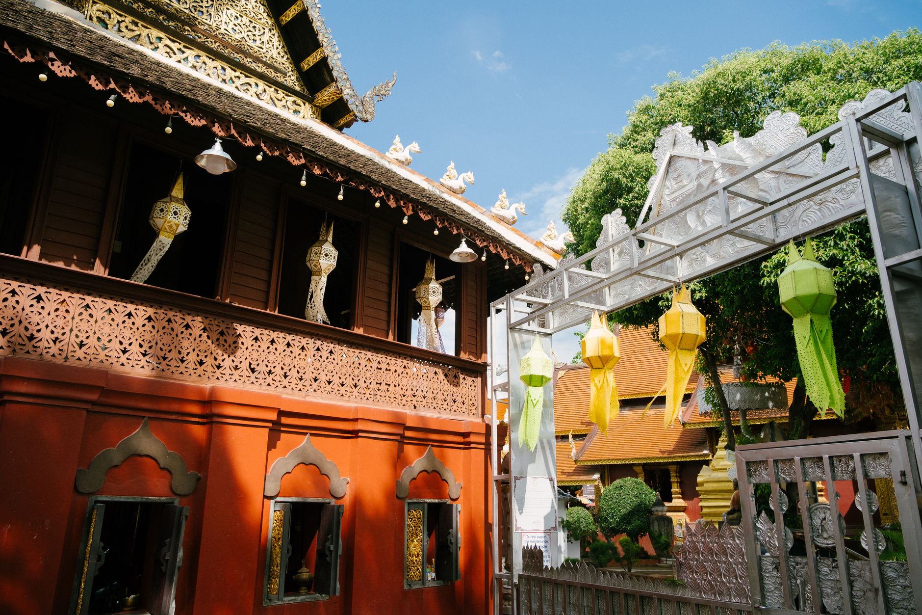 Chiang Mai Old Town street scene with temples, cafes and daily life around the moat
