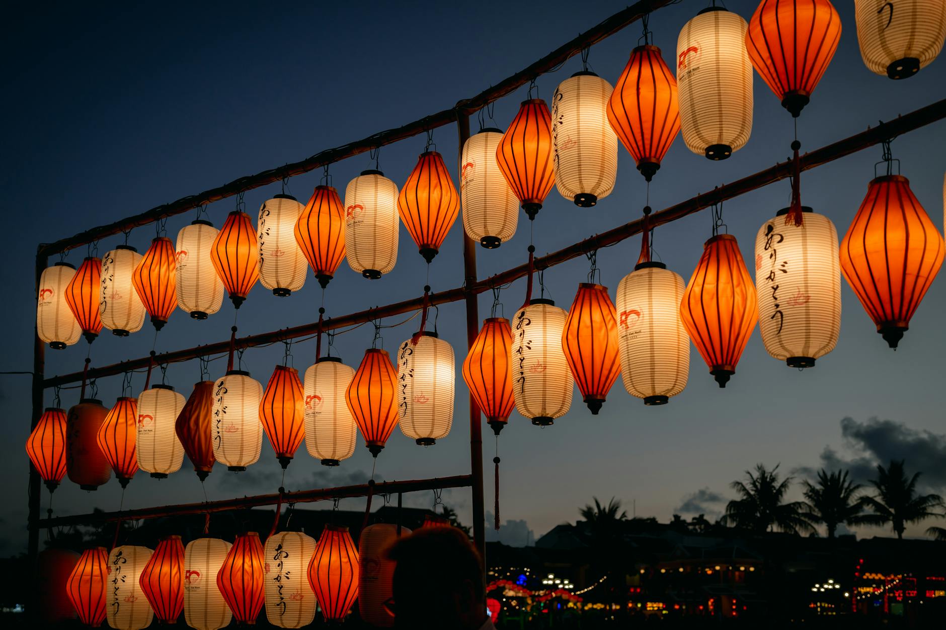 Loy Krathong festival with floating lanterns on water