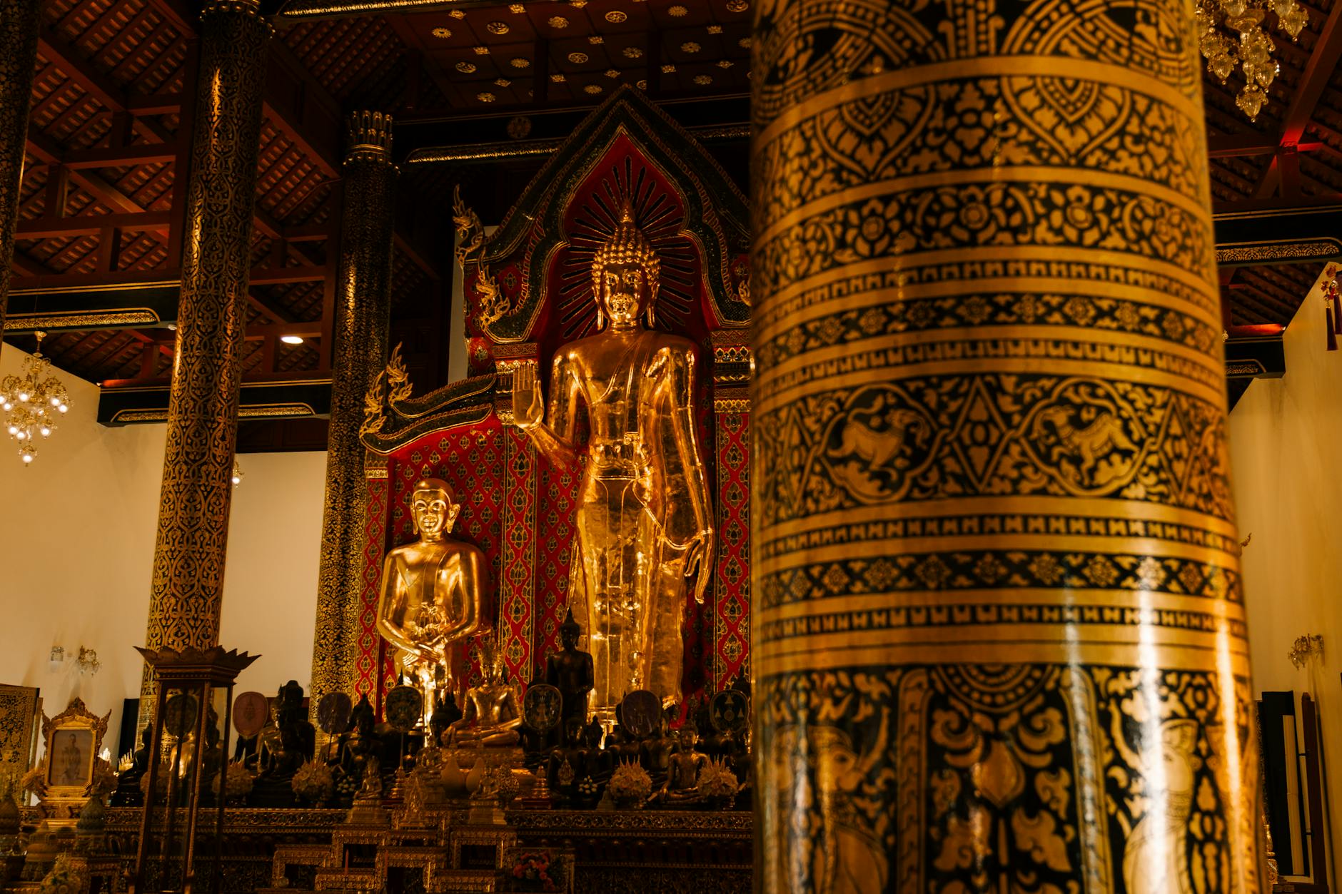 A sea of candlelights during the evening wian thian procession at a large Thai temple