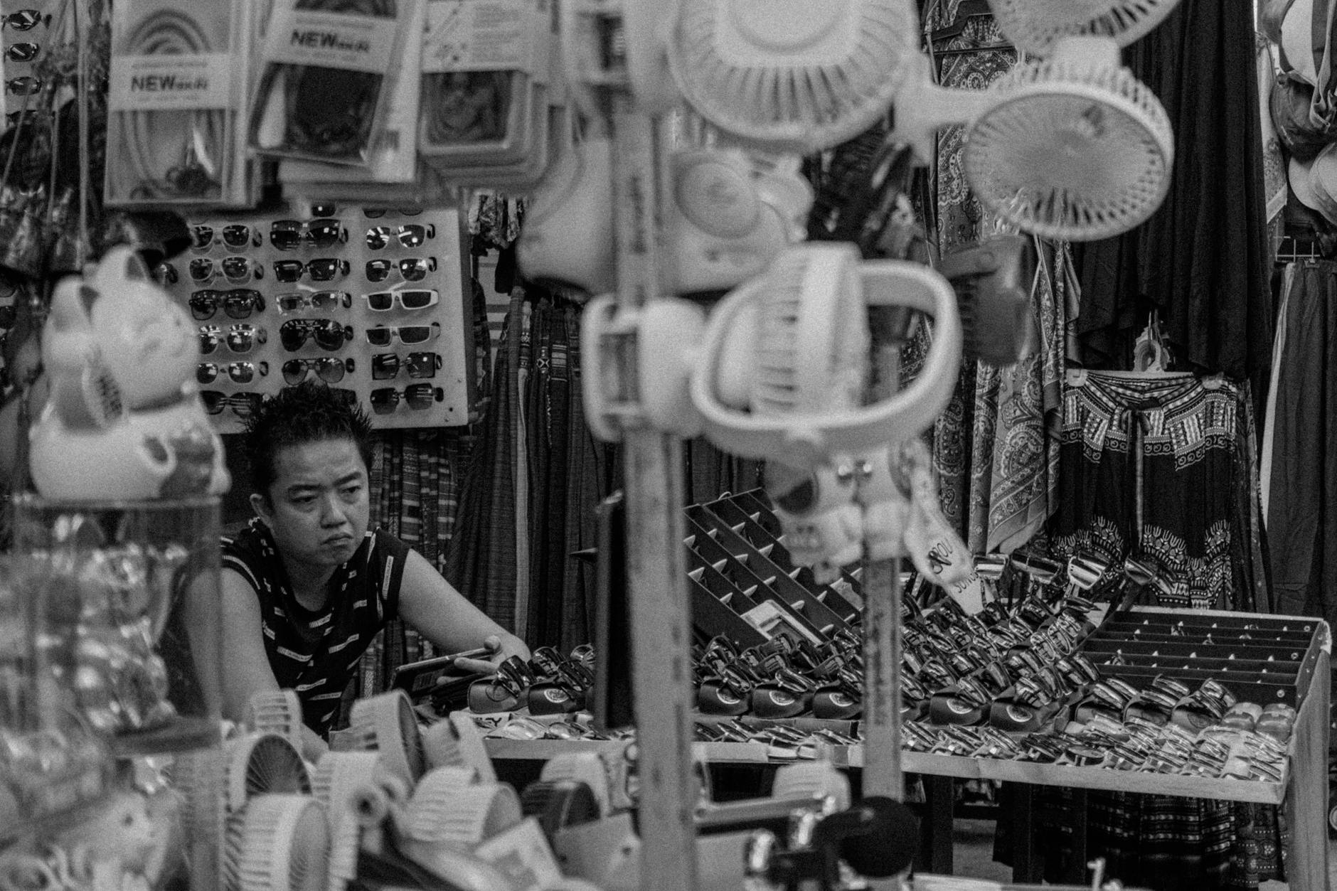 A vendor arranging an elaborate display of mooncakes in Bangkok's Chinatown ahead of the festival