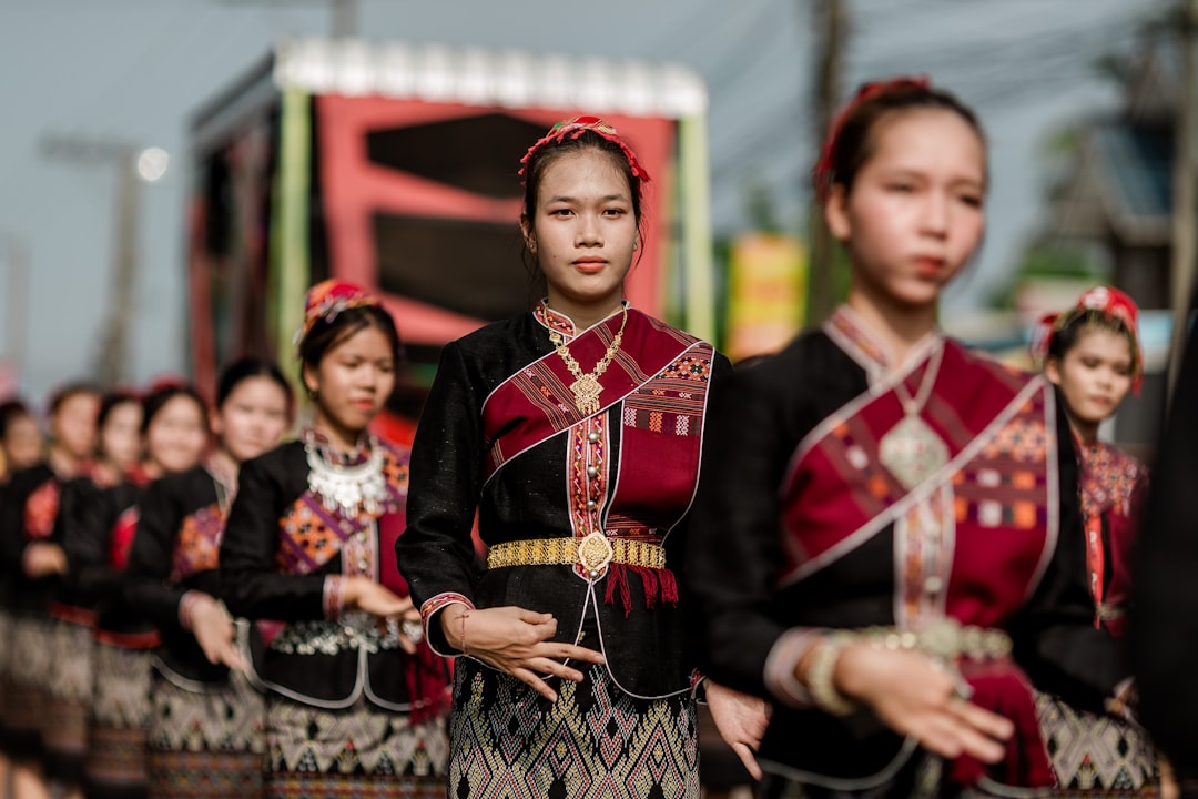 Collage of various Thai festivals including Songkran water fights, Loy Krathong lanterns, and temple ceremonies