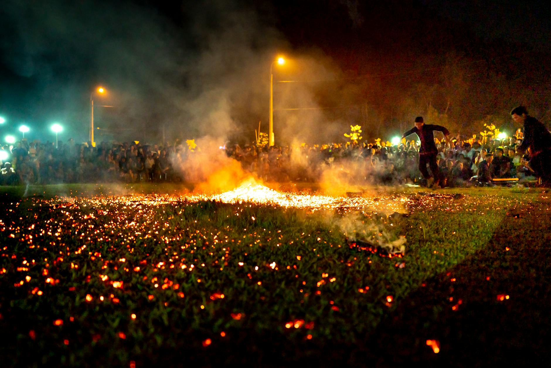 Mass synchronized lantern release at Mae Jo University with thousands of khom loy ascending together